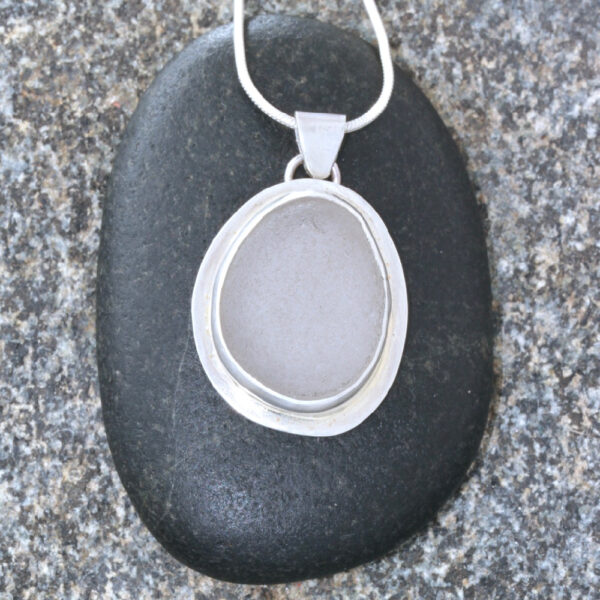 Bezelled Guernsey sea glass & sterling silver pendant.